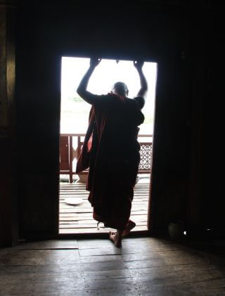 Monk in a doorway
