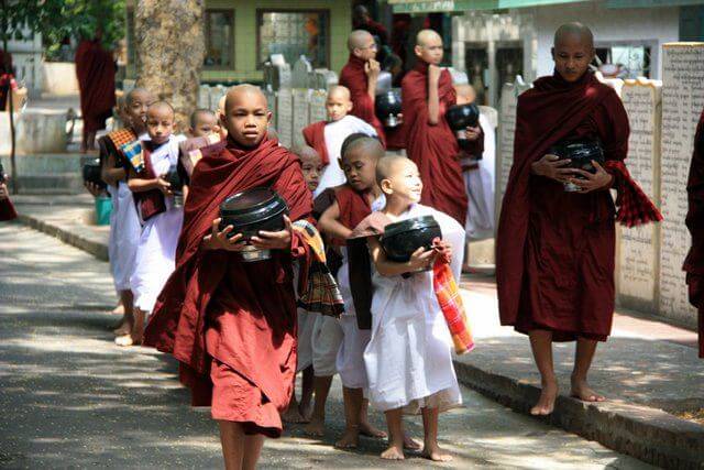 Monks lining up for their daily meal