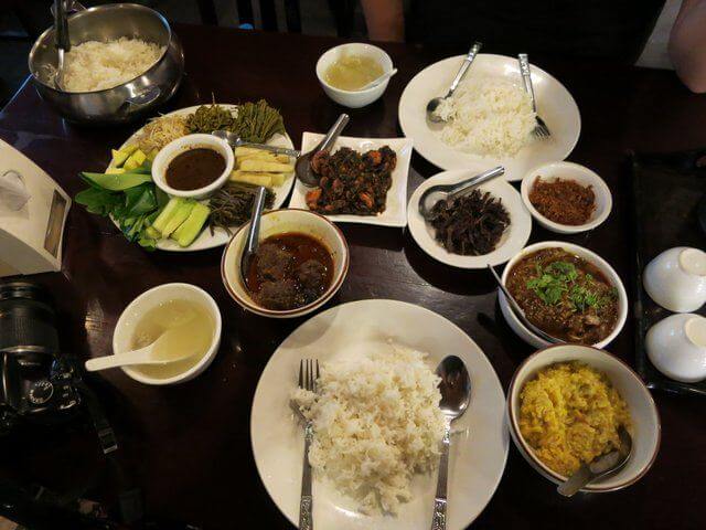 Myanmar curry, served with a selection of side dishes