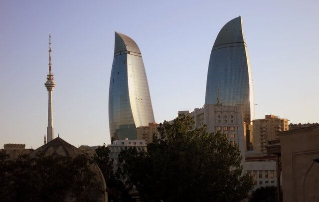 Baku's Flame Towers rising over the Old Town