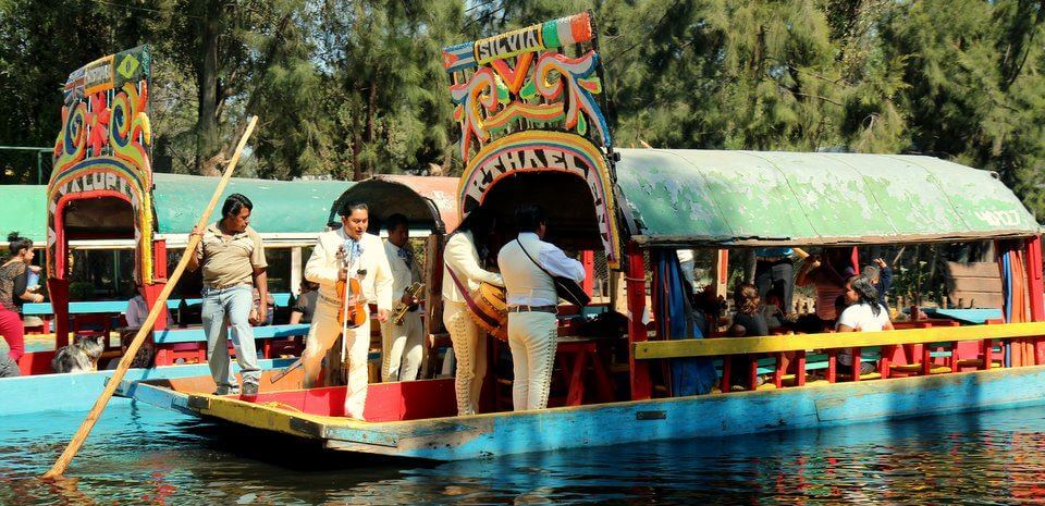 Mariachis board a boat at Xochimilco floating city