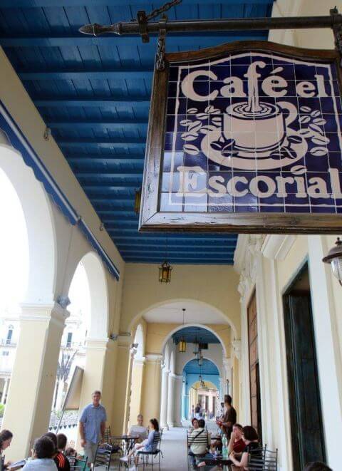 People watching outside Cafe El Escorial