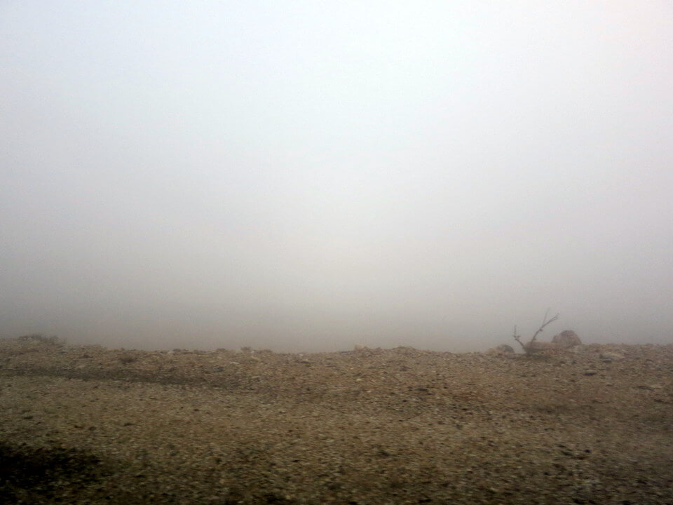 Driving through the mist above Wadi Rum